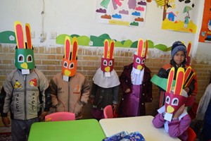 Children playing with masks made by themselves from book characters - Read with Me in South Khorasan - Jan 2016