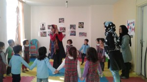 Children playing in a Reading Aloud Session - Read with Me in MahmoodAbad, Tehran - Jan 2016