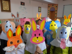 Children playing with masks made by themselves from book characters - Read with Me in South Khorasan - Mar 2016